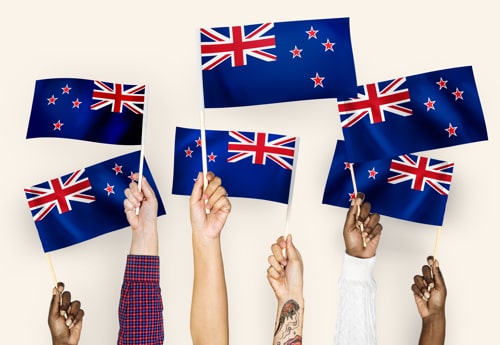 Hands Waving Flags New Zealand Min
